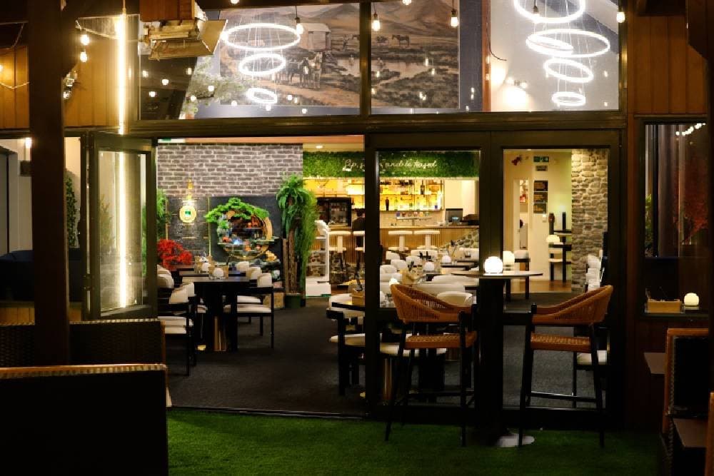 Cade delivering cocktails